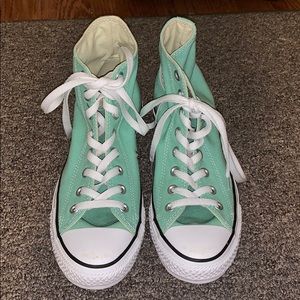 Light teal high top converse
